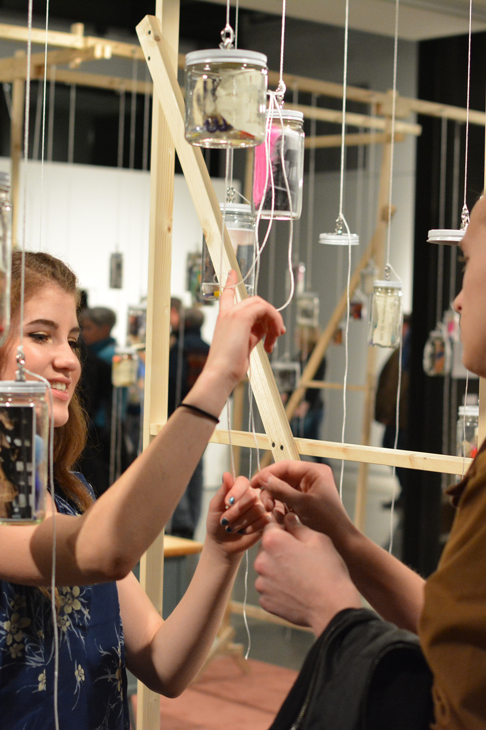 Two Visitors Hanging their Jar